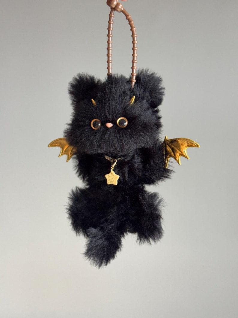 Golden Batwing Black Cat Charm: Poseable Handmade Accessory