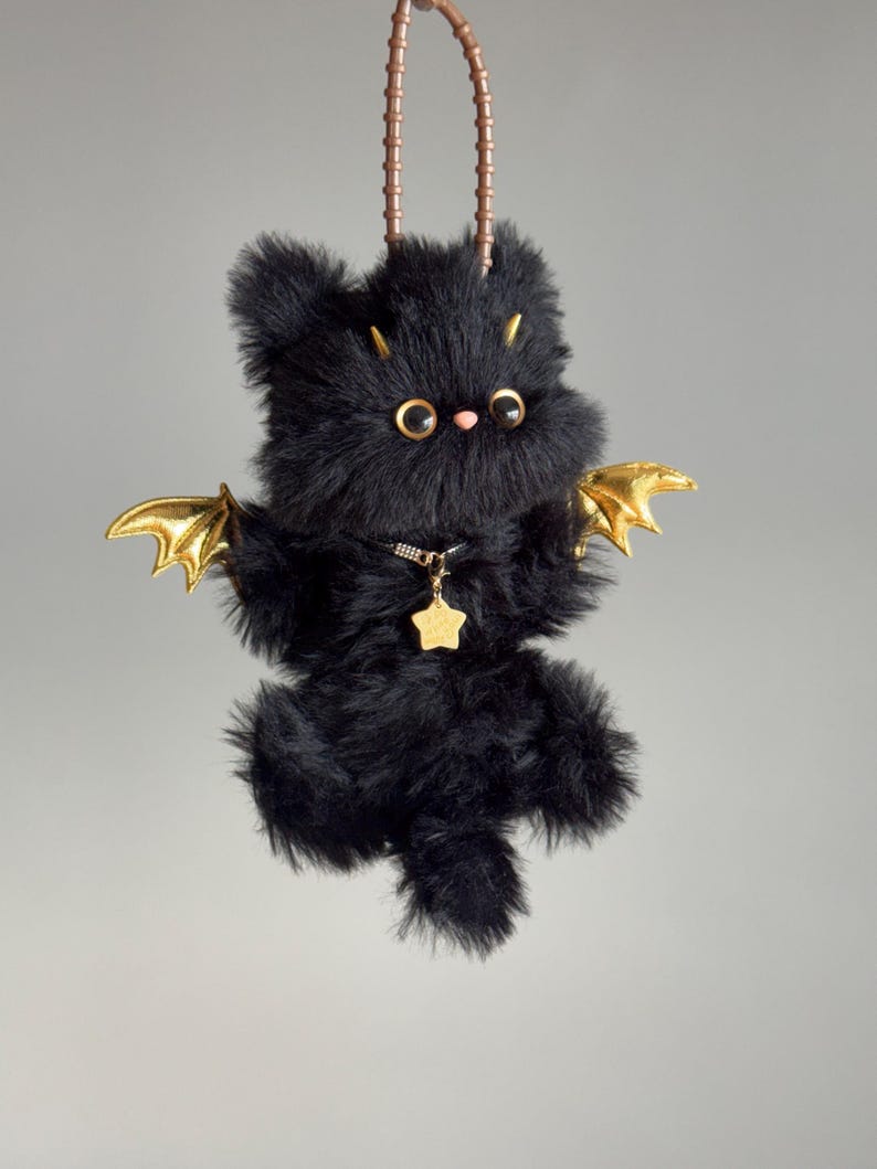 Golden Batwing Black Cat Charm: Poseable Handmade Accessory